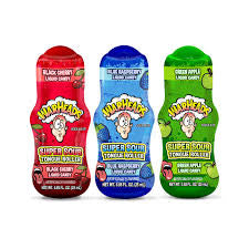 WARHEADS SUPER SOUR TONGUE ROLLERS IN DISPLAY