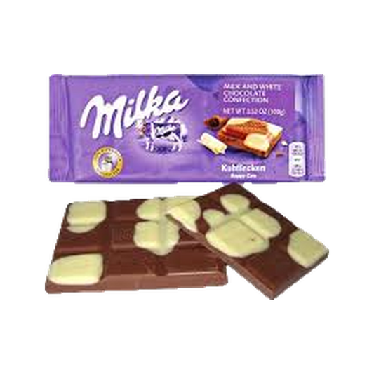 MILKA BAR IN DISPLAY - HAPPY COW MILK & WHITE — chocolate